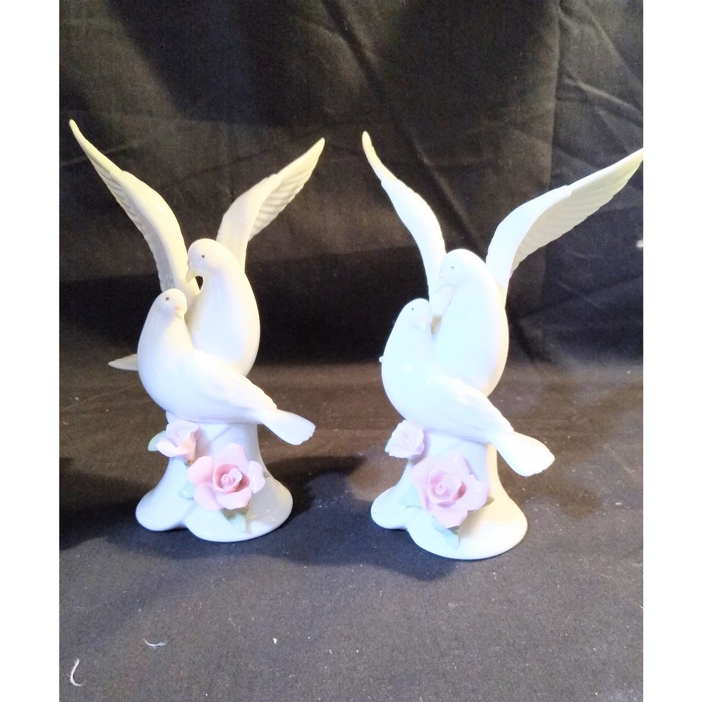 Porcelain Dove sitting on tree or brunch